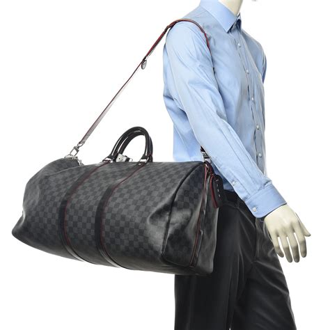 LOUIS VUITTON Damier Graphite Keepall Bandouliere.